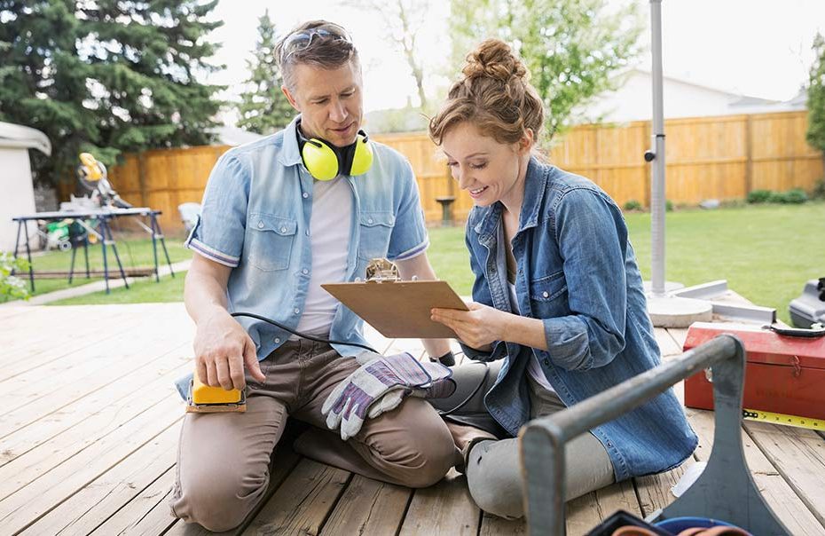 Man and Woman working on a new deck