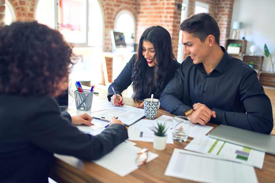 A young couple applies for a conventional vs fha loan.